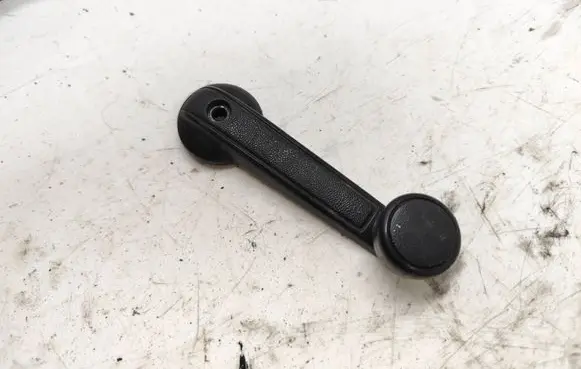 Datsun 100 Front door window winding handle 