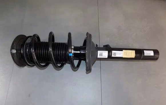 Volkswagen Golf VII Front shock absorber with coil spring 5Q0412014MG