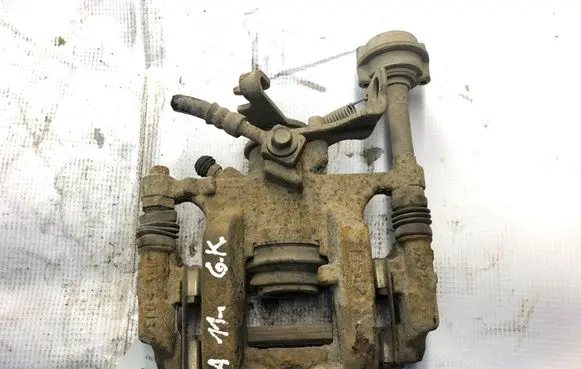 Opel Astra J Rear brake caliper