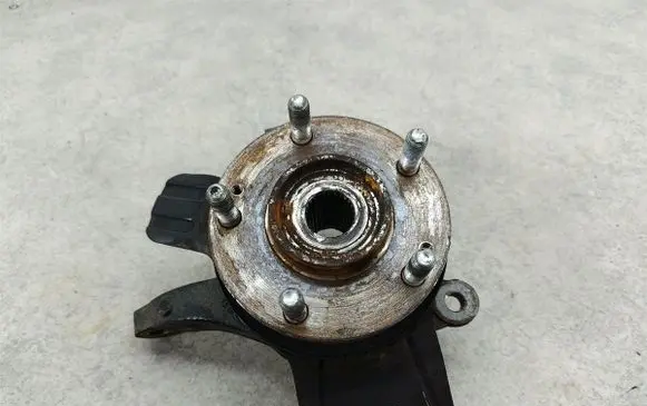 KIA Carens III Front wheel hub spindle knuckle 