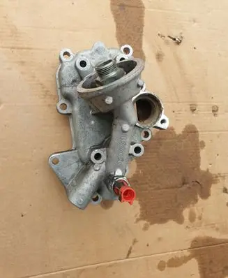 Oil filter mounting bracket