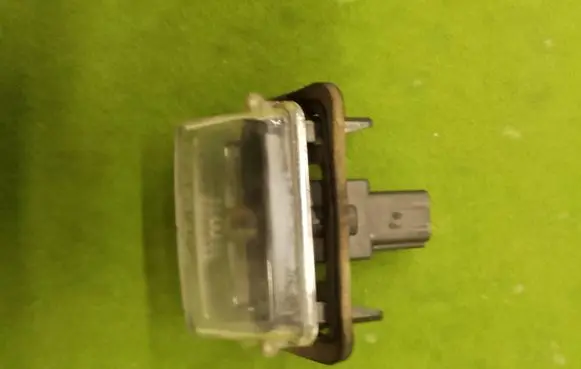 Toyota Yaris Number plate light SAEFEKAOD76 L-00 0012