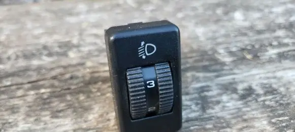 Volkswagen Golf III Headlight level height control switch 357941333