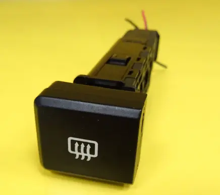 KIA Carens II Windscreen/window heater switch