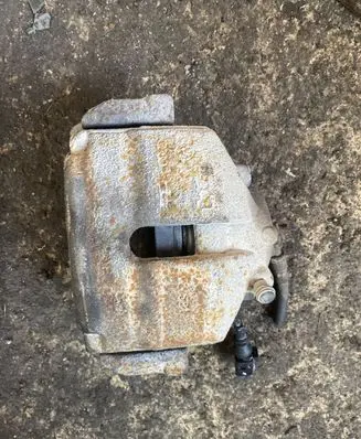 Volkswagen Golf V Front brake caliper