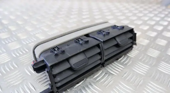Toyota Yaris XP210 Dash center air vent grill 55670K0050