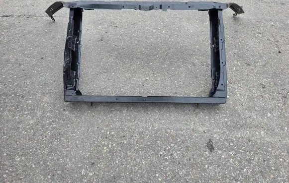 Top upper radiator support slam panel