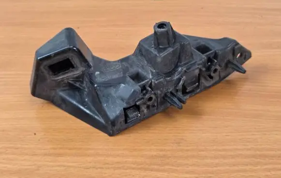Ford Focus Front bumper mounting bracket JX7B17D959