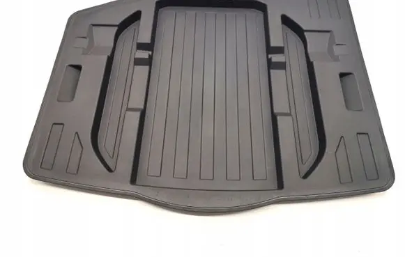 Trunk bottom trim panel