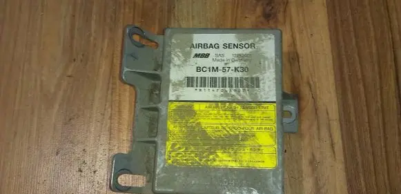 Mazda 323 Airbag control unit/module BC1M57K30
