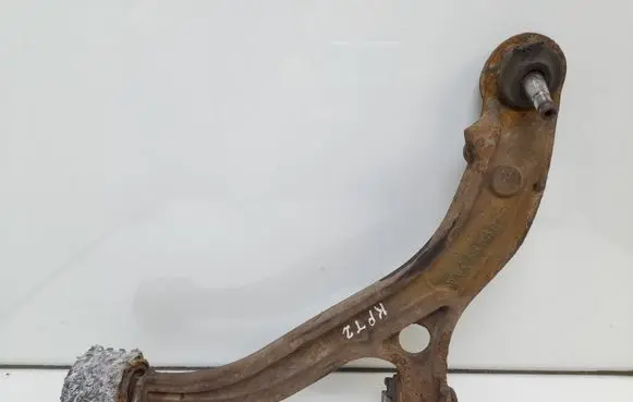 Chrysler Voyager Front lower control arm/wishbone 04694973AA