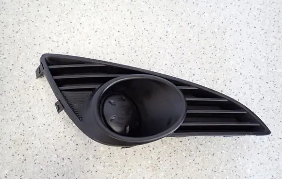 Suzuki Splash Front fog light trim/grill 