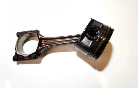 Volkswagen Golf IV Piston with connecting rod 058