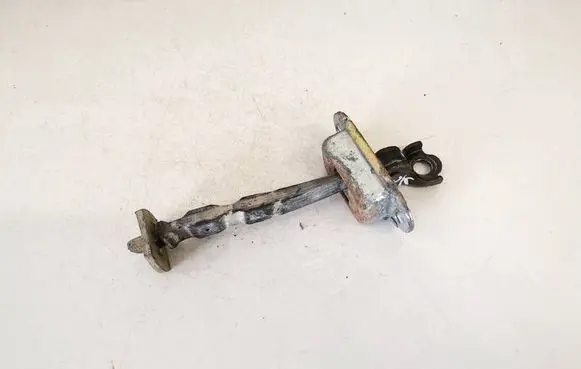 Front door check strap stopper