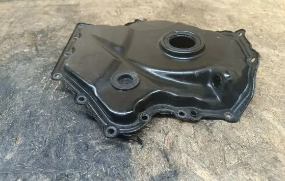 Volkswagen Golf VII Timing chain cover 06K109210AF