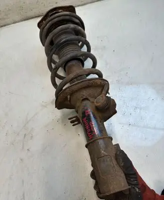 Hyundai Getz Front shock absorber with coil spring 213123