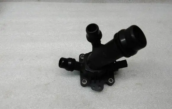 Thermostat/thermostat housing