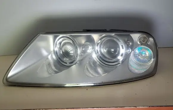 Volkswagen Touareg I Headlight/headlamp 7L6941015BB 89307851