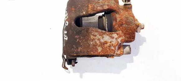 Opel Astra G Front brake caliper 