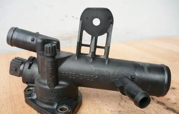 Thermostat/thermostat housing
