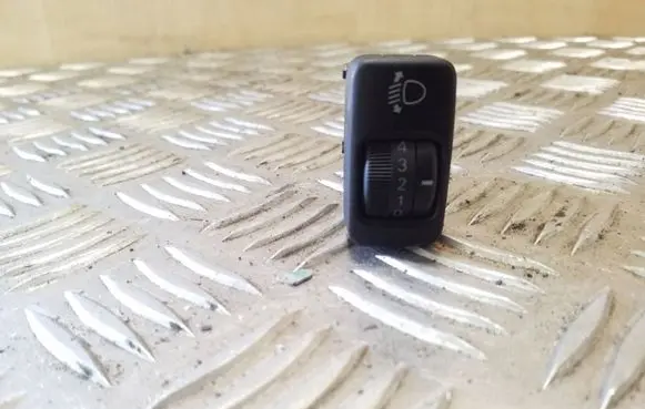 Headlight level height control switch