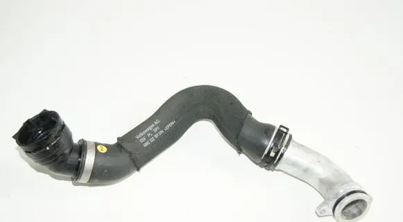 Volkswagen Touareg II Engine coolant pipe/hose 06M121137AA