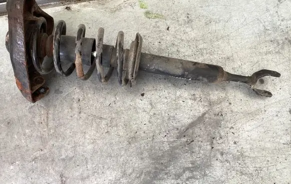 Volkswagen PASSAT B5 Front shock absorber with coil spring 8D0412131F