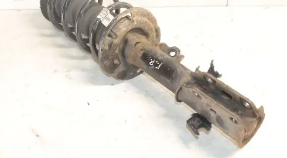 Ford Puma Front shock absorber with coil spring L1TC18K001 1A101266B