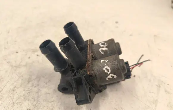 Coolant heater control valve
