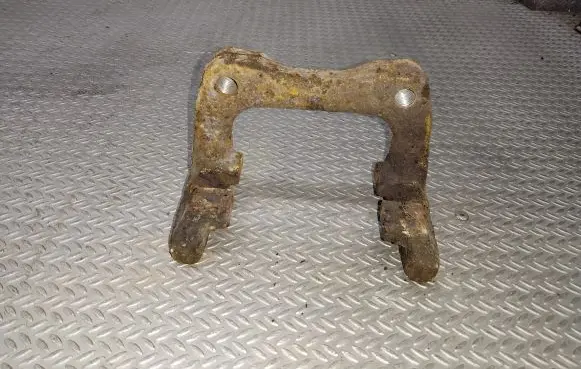 Volkswagen Golf V Brake caliper pad carrier rear 