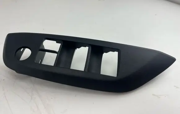 Toyota Yaris XP210 Front door window switch trim 74231K0120