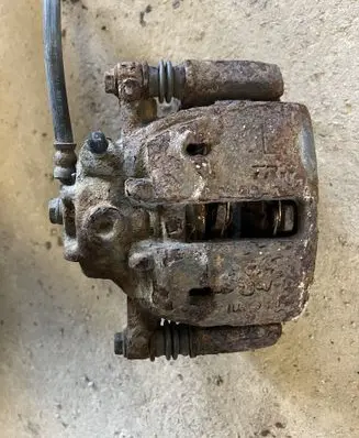Mitsubishi Colt Front brake caliper