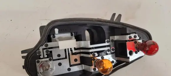 Citroen C3 Tail light bulb cover holder