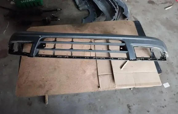 Volkswagen Touran I Front bumper lip 1T0805903 13386