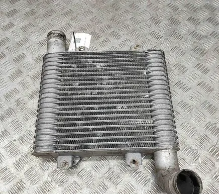 KIA Carens I Intercooler radiator 2827127350