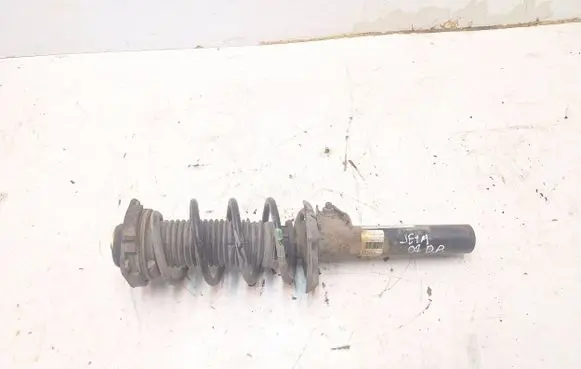 Volkswagen Jetta V Front shock absorber with coil spring 1K0400040 6000272203