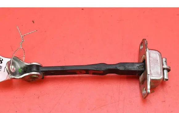 Front door check strap stopper