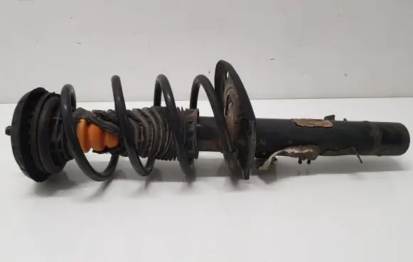 Front shock absorber with coil spring