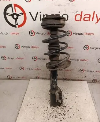 Renault Clio III Front shock absorber with coil spring