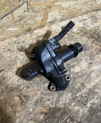 Thermostat/thermostat housing