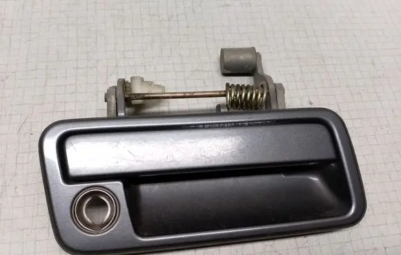 Mazda 323 F Front door exterior handle