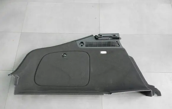 Trunk/boot lower side trim panel