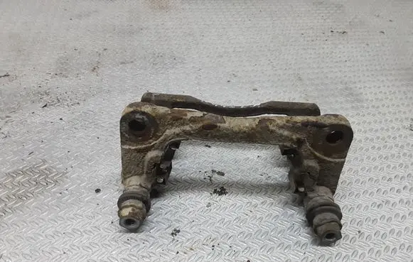 Suzuki Swift I Front Brake Caliper Pad/Carrier 