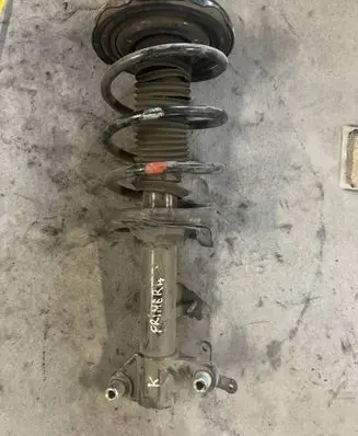 Nissan Primera Front shock absorber with coil spring
