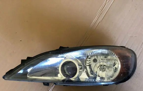 Nissan Primera Headlight/headlamp 89005897
