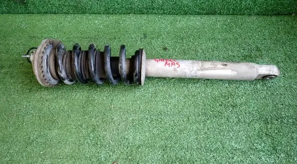 Front shock absorber with coil spring