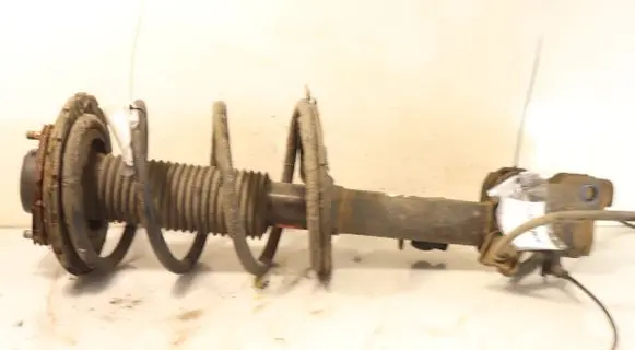 Front shock absorber with coil spring