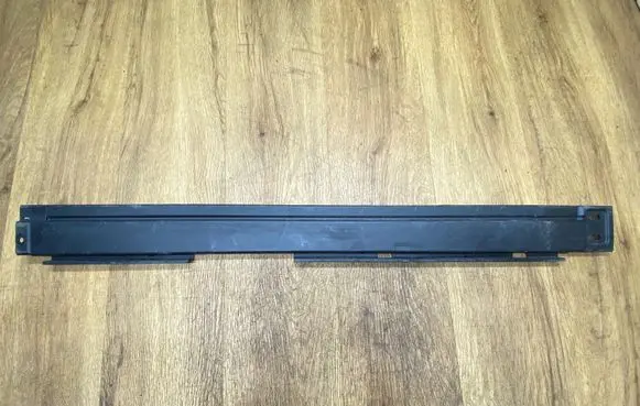 Trunk/boot lower side trim panel