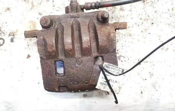 Subaru Legacy Front brake caliper tokico