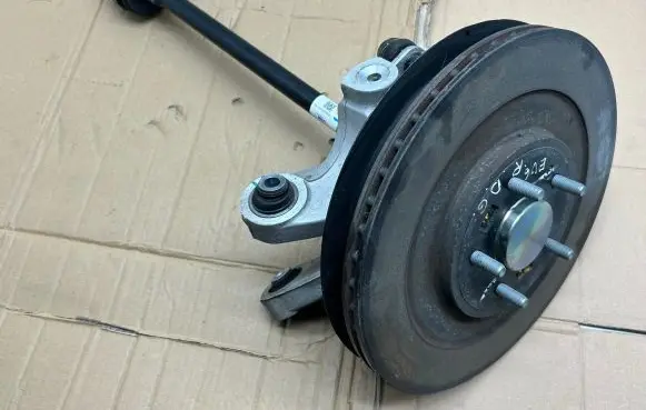 Rear wheel hub spindle/knuckle